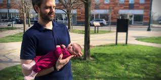 Graduate's new title is not only doctor, it's also Dad