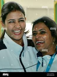 Gold medal winners India's Sushma Rana, left, and Saroja Kumari Jhuthu  react after winning the women's 25 meters Pistol Pairs event of the  Commonwealth Games in Melbourne, Australia, Friday March 17, 2006.