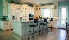 This technic adds some depth and color finish to the cabinet. Hampton Linen Glazed River Run
