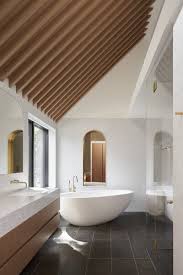 Common towel bar placement falls between 42 and 48 inches as measured from the bathroom floor, but they can range anywhere from 30 to 52 inches. Photo 5 Of 11 In Bath Tile Freestanding Photos From A Tree Grows In The Center Of This Restrained Tokyo Home Dwell