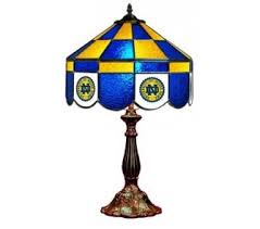 Whether you're searching for specific team merchandise like shower curtains, trash cans and doormats or simply looking. Notre Dame Fighting Irish Mvp 14 Executive Stained Glass Table Lamp Onlinesports Com