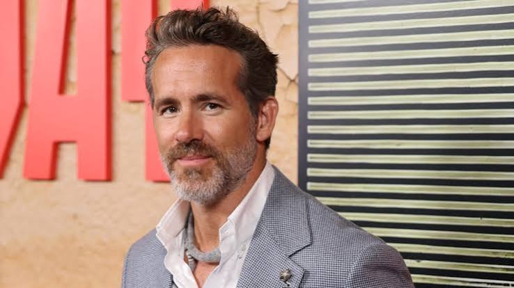 Ryan Reynolds Wears Plush Necklace to Match His Gray Suit at 'Mayday' NYC Premiere | Just Jared - Celebrity News, Entertainment News & Photos
