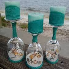 Then, using hot glue place your circle base on the top of the cover the candle with twine and low temp glue gun since i was glueing into wax , i used a battery operated ones for safety. 92 Sand And Seashells Wine Glass Candle Holders Ideas Wine Glass Candle Holder Wine Glass Candle Candle Holders