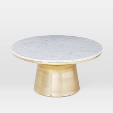 Inspired by a vintage italian find, its luxurious bright white marble top sits stop a monumental white base. Marble Topped Pedestal Coffee Table In 2021 West Elm Coffee Table Coffee Table White Pedestal Coffee Table