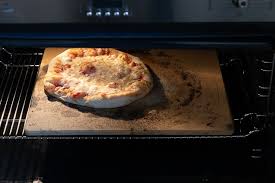 The convenient serving rack makes it easy to remove the hot stone from the oven. The Best Pizza Stone And Baking Steel Reviews By Wirecutter