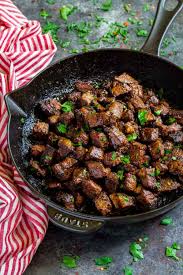 Turn the steaks and add the butter, thyme. Steak Bites With Garlic Buter Dinner Or Steak Appetizers Confetti Bliss