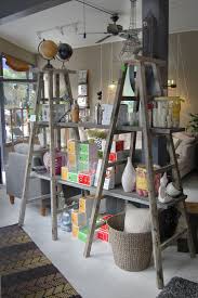 What's stopping each shelf from flipping and dumping their contents on the floor? How To Decorate With Vintage Ladders 20 Ways To Inspire
