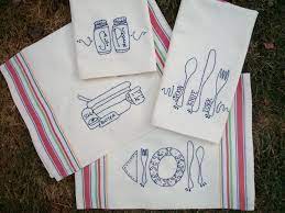 Vintage, redwork and toile designs are popular styles for these embroidered flour sack tea towels. New Kitchen Tea Towel Embroidery Pattern Tea Towels Embroidery Embroidery Patterns Vintage Towel Embroidery