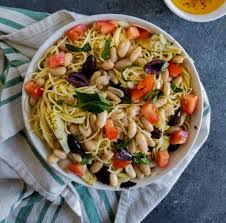 Italian Olive Oil Pasta Takes Less Than 30 Minutes And Is Filled With Cannellini Beans Kalamata Olives Marinat Olive Oil Pasta Italian Olives Stuffed Peppers