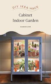 People Are Hacking Ikea Cabinets Into Indoor Gardens Hunker Indoor Greenhouse Indoor Gardens Plant Decor Indoor