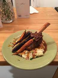 Homemade Braised Lamb Shank Over Mashed Potatoes Port Wine Reduction And Carrots Food Recipes Braised Lamb Sweet Carrot Lamb Shanks