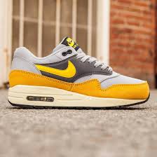 Nike Women Air Max 1 Essential Gold Wolf Grey Varsity Maize Gold Leaf Dark Grey Nike Women Nike Air Max Mens Nike