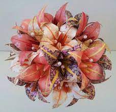 Photo art, a handwritten letter, a jar of love notes, paper flowers, and books are all gifts worth giving. Paper Flower Bouquet Wedding Anniversary Origami Flowers Etsy Paper Flowers Paper Bouquet Origami Bouquet