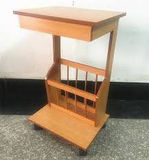 A freestanding accent table with a magazine rack will add a designer touch to any space; Wooden Side Table Coffee Table With Magazine Holder Wood Snack Table Buy Wooden Side Table Coffee Table Wood Snack Table Magazine Table Product On Alibaba Com