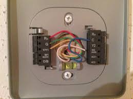 Something could have pinched the wire bundle or fell on it from inside the wall and damaged it. Nest Thermostat And Running A C Wire From A C Air Handler C Wire Heating Help The Wall