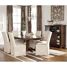 Coated in a warm finish, the hazelteen dining set proves to be small in scale, yet big on style. Porter Dining Room Set W Burkesville Chairs Ashley Furniture Dining Table Ashley Furniture Round Dining Room Sets