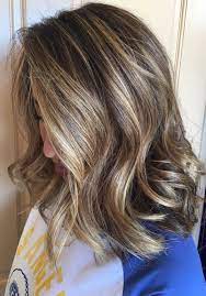 How About A Side Of Blonde With Your Brunette Champagne Highlights Melted Over A Smokey Brown Base Hair Styles Brown Hair With Highlights Light Brown Hair