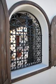 Browse 237 wrought iron window grilles on houzz. Old World Design Ideas Pictures Remodel And Decor Iron Window Window Grill Design Iron Window Grill