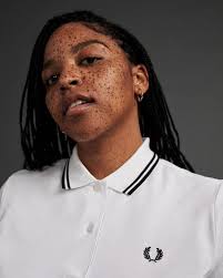 Lina Giselle Murillo wears the Fred Perry Shirt in White