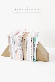 Start by mixing a regular batch of concrete. Diy Triangle Bookends Almost Makes Perfect