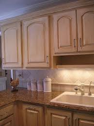 Kitchen Makeover On A Super Small Budget Repainting Kitchen Cabinets Brown Kitchen Cabinets Oak Kitchen Cabinets
