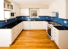 If you want an airy feel to your kitchen, good ole white will work just perfectly though you might want to consider a contrasting grout color for an unexpected twist. Blue Tile Backsplash Kitchen Whaciendobuenasmigas