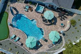 This particular setting has ample concrete immediately bordering the water, providing a smooth walking area. County Materials Receives Top Honors At 2019 Excellence In Hardscape Design Competition