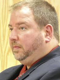 Woman asks Bucyrus school board to reject basketball coaches' contract