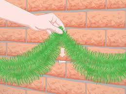 Hanging garland from nails is the easiest way to add holiday décor to your home, but if your home has a brick exterior, you know that nails will not penetrate, and glue does make a christmas display of garland anywhere, even on a brick wall or mantle. 3 Simple Ways To Hang Garland On Brick Wikihow