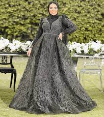 فساتين سهرة بكم طويل للمحجبات 2023 | مجلة سيدتي