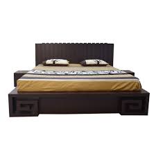 The rich espresso finish flows smoothly over the stacked design while beautifully accenting the button tufted faux leather upholstery and stylish nail head accents to make the diana bedroom collection. Diana Bedroom Set