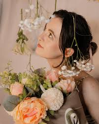 can't say I've ever talked to flowers but I DID turn them into a functional  purse 🥰 Thank you for the catalogue photoshoot @itswillduff !!!!