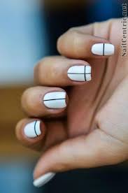 For A Minimalist Take On Striped Nail Art Cross Your White Nails With Single Black Lines See More At Na Nail Art Stripes Simple Nail Art Designs Simple Nails