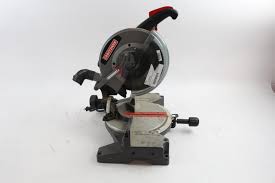 You must push the saw down as far as it will go, then pull the pin out to release the blade. Craftsman Compound Miter Saw Property Room