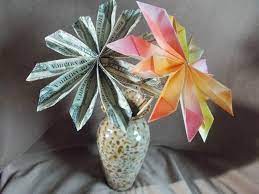 We need 2 dollar bills, threads, a bead. Origami Money Flowers Lovetoknow