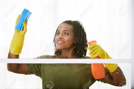 Download free image woman wearing black jacket and black framed eyeglasses. Positive Black Woman Wearing Rubber Gloves When Cleaning Window Stock Photo Picture And Royalty Free Image Image 113401678
