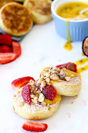 Homemade Crumpets With Passionfruit Curd Hazelnut Crumble And Strawberries The Brick Kitchen Recipe Homemade Crumpets Sweet Savory Yummy Breakfast