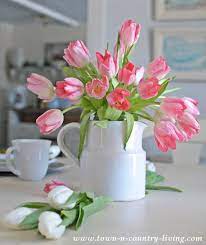 Easy Tulip Arrangement With White Ironstone Town Country Living Tulips Arrangement Beautiful Flower Arrangements Spring Floral Arrangements