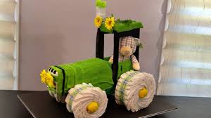 If you want to play security, it is better to adapt the theme of the gift to the one chosen for the baby shower (pink, circus, disney etc). Tractor Diaper Cake Baby Shower Diy Tarta De Panales Tutorial Youtube