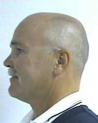 Man shoots burglar in leg at OKC hot rod shop