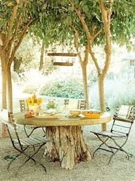 11 Pictures Of Crazy Cool Uses For Tree Stumps Stump Table Outdoor Tree Stump Table Garden Table