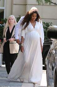 Ciara Looks Angelic In White As She Shows Off Large Baby Bump Maternity Dresses For Baby Shower Baby Shower Dresses White Maternity Dresses