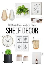 These porcelain decorative plates are suitable for wall they are neatly arranged with larger pieces in the centre and the smaller ones surrounding them. 5 Must Have Shelf Decor Items For Intentional Design Allisa Jacobs Shelf Decor Modern Shelf Decor Wall Shelf Decor
