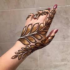 Richa & hitesh real wedding maroon silk layered lehenga styled with floral jewellery and hands covered in intricately patterned mehndi design. Full Screen Mehndi Design Arabic Easy Full Hand Cute766