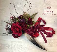 Deep red dahlias, pale pink astilbe, kangaroo paws, nike cymbidum orchids, autumn antique hydrangea, hearts garden rose, coxcomb celesoia, pepper berries, and. Viking Wedding Boquet Viking Wedding Nordic Wedding Medieval Wedding