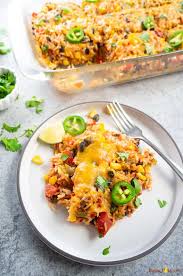 Healthy Vegetarian Mexican Rice Bean Casserole Is Easy To Make And Filled With Cheesy Goodness Vegetarian Mexican Vegetarian Casserole Mexican Rice Casserole