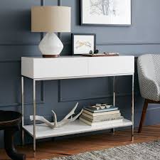 Excellent condition and sold out white west elm coffee table with storage! Lacquer Storage Console