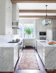Maybe you would like to learn more about one of these? Transitional White Kitchen With Steel Inlaid Cabinetry Luxe Interiors Design