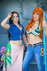 May on X: Nami & Nico Robin - One Piece v. Time Skip Cosplay | Nami  @firecloak | Robin: Foxbent | Chopper @AConnerson | 📷@0takore | Nami  NicoRobin OnePiece Chopper cosplay ardawigs 