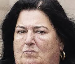 Gangster's girlfriend cleared of drugs rap